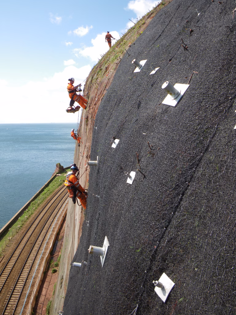 Cliff face with anchors