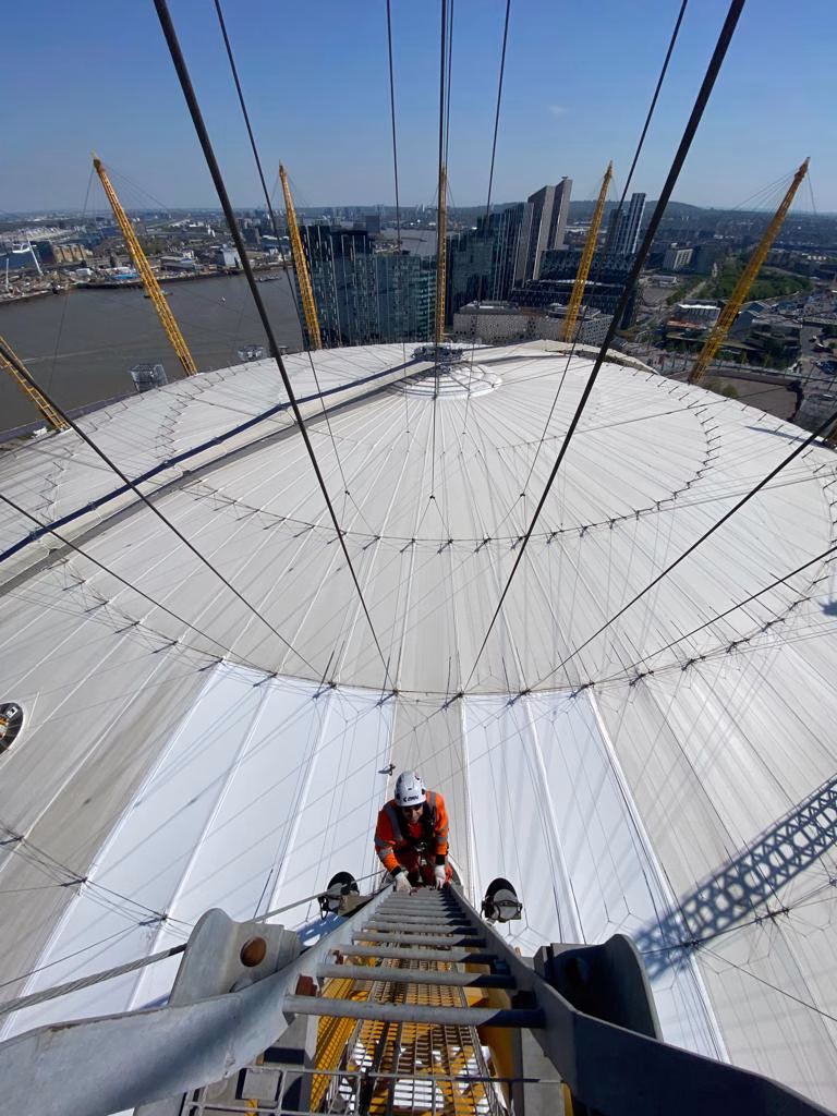 Worker above the millennium dome