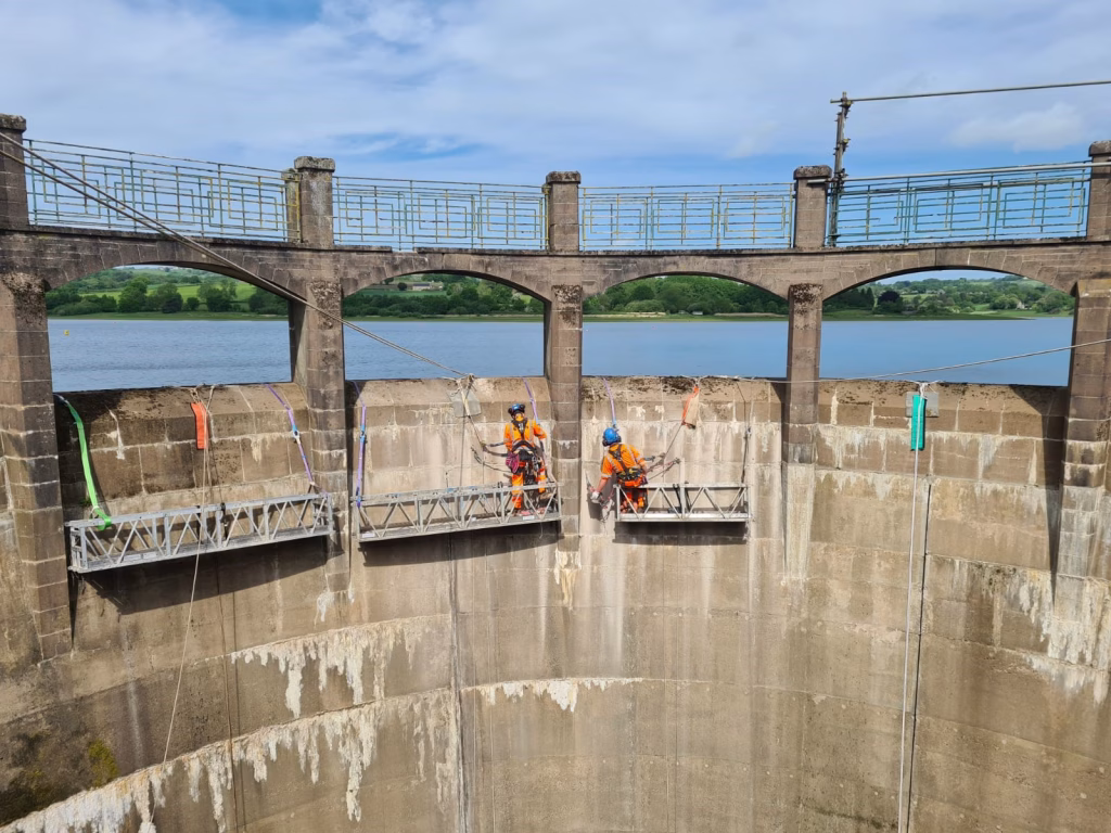 Workers on a dam