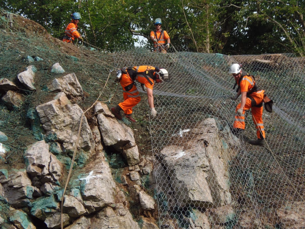 Team installing rockfall netting.