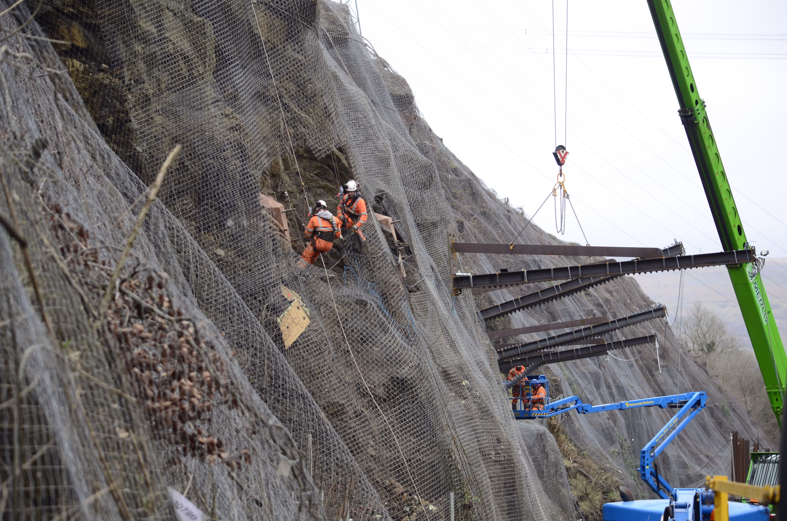 Workers on a rock face